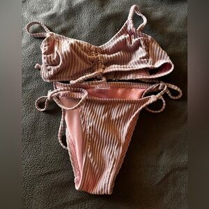 pink & silver 2 piece swimsuit
size: xs
brand: xhilaration
worn twice